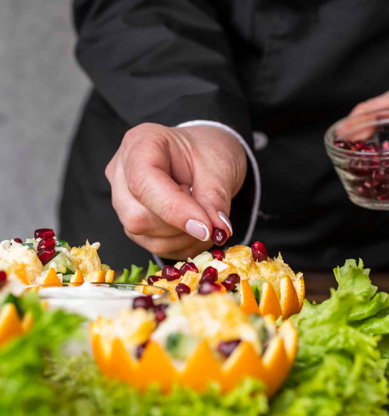 chef-preparing-fruit-dish